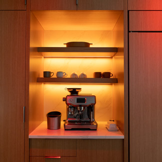 Luxury coffee bar featuring Lutron Lumaris Lightstrips and Ketra full RGB downlights